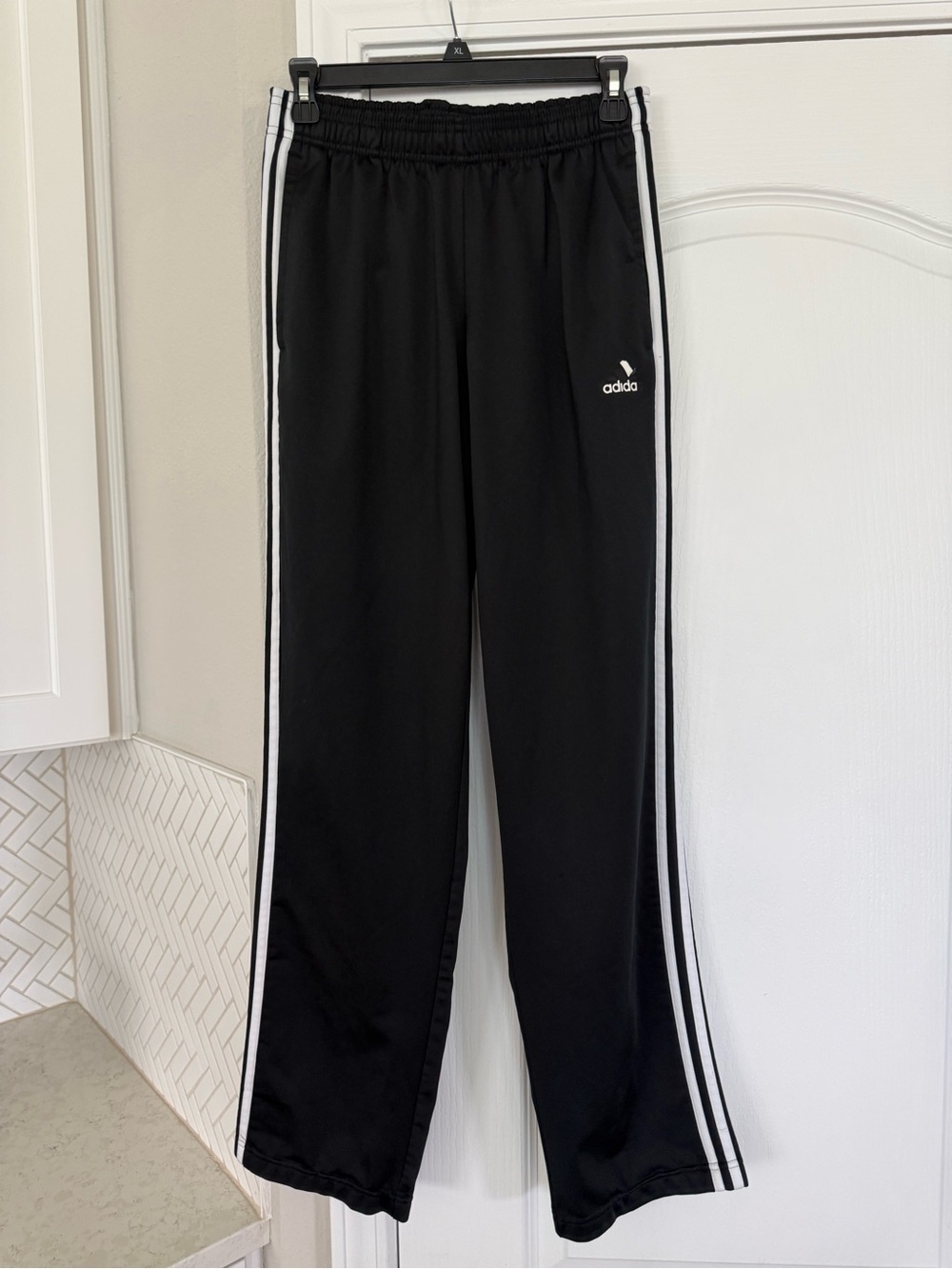 Adidas Women’s Black Jogger Pants with White Logo Tag